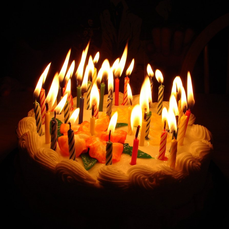 Birthday_Cake_with_Lit_Candles.jpg